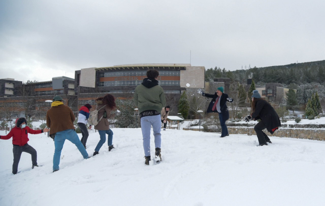 The Rector Çiçek played snowball with the students.